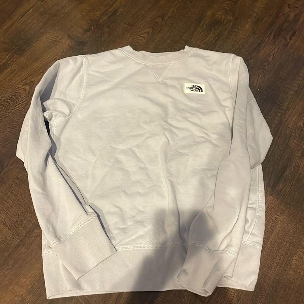 light blue north face crewneck, size small, never worn